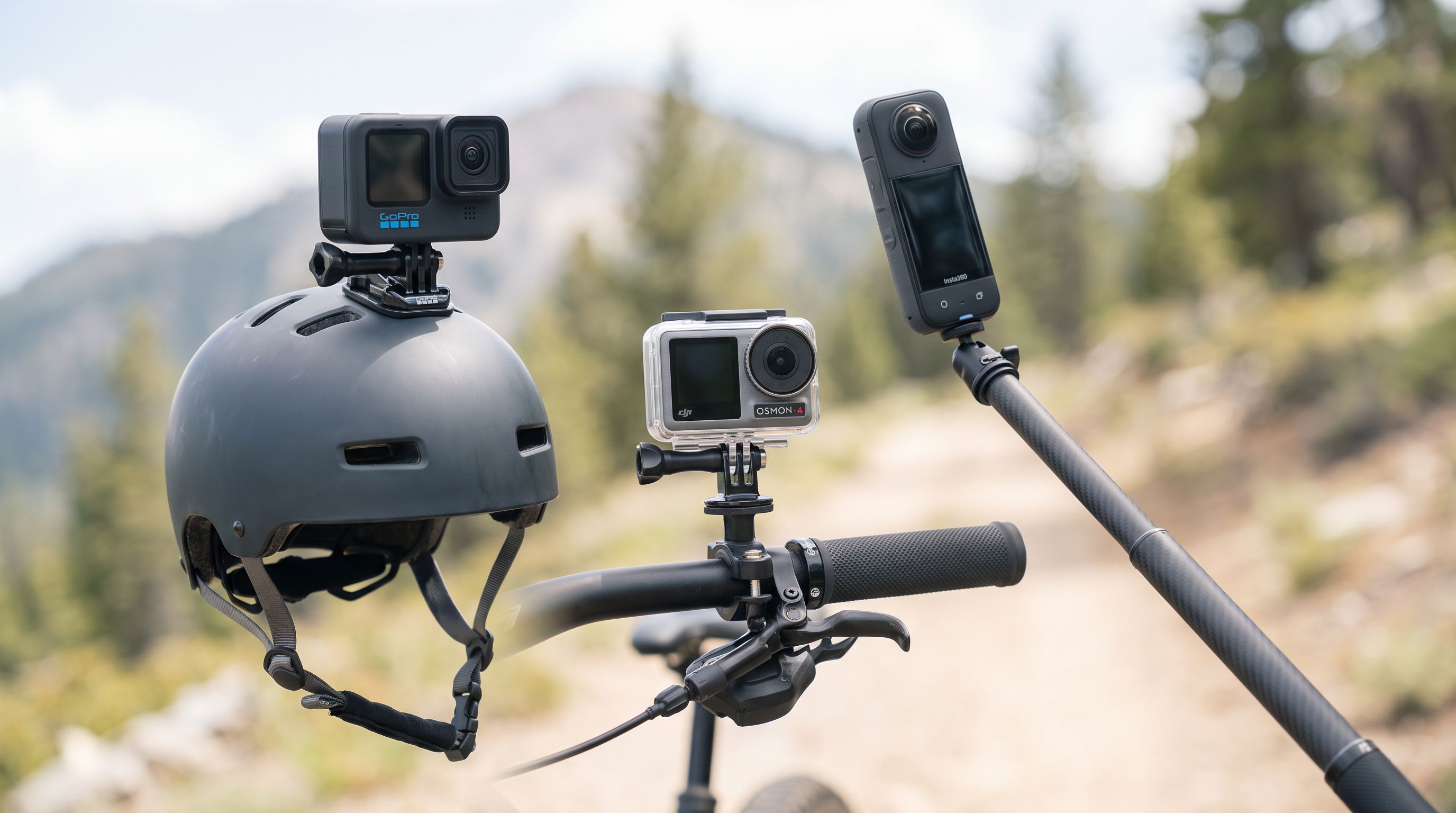 Three action cameras — a GoPro, a DJI Osmo Action and an Insta360 — mounted on a helmet, handlebar and selfie stick against an outdoor background